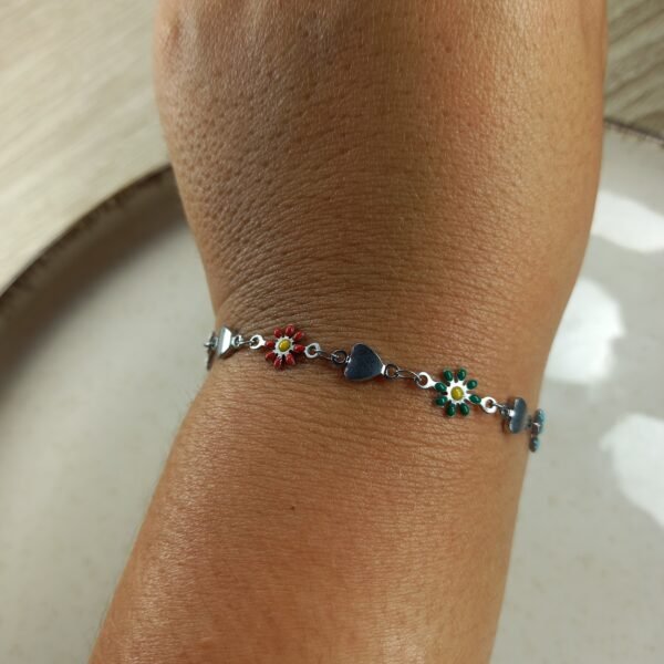 Pulsera Tifany con corazon y margaritas multicolores.