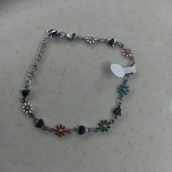 Pulsera Tifany con corazon y margaritas multicolores.