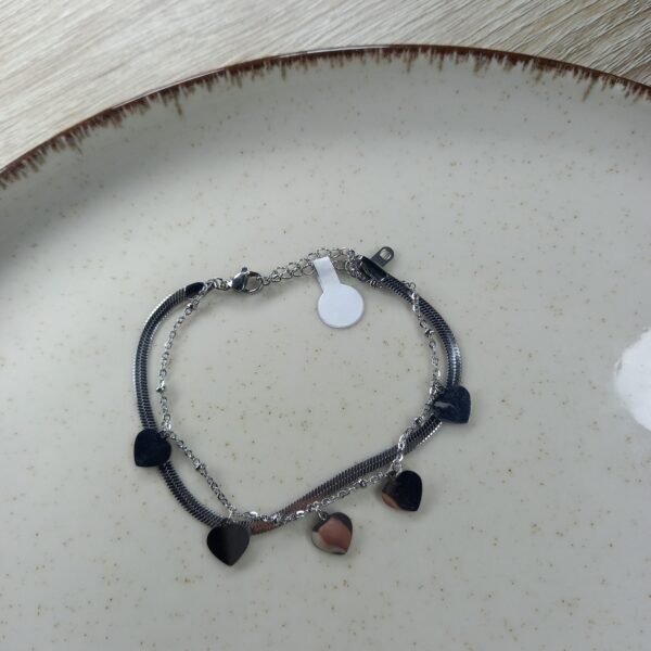 Pulsera doble cadena - Fina y Serpiente con dijes de cerrazón.
