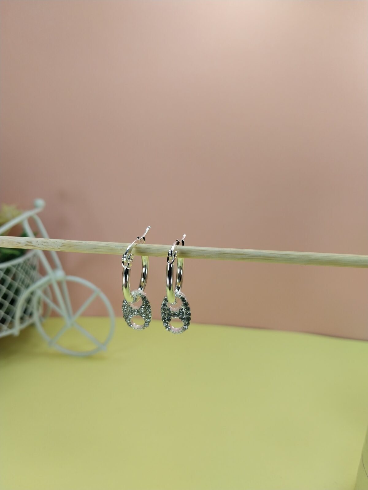 Argollas + Dije Chapitas Blanca