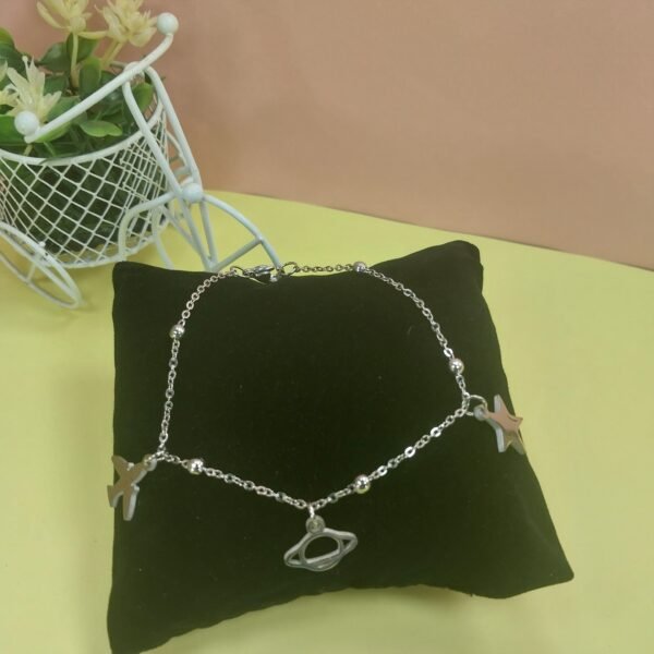 Pulsera con dijes Avión + Saturno + Estrellita
