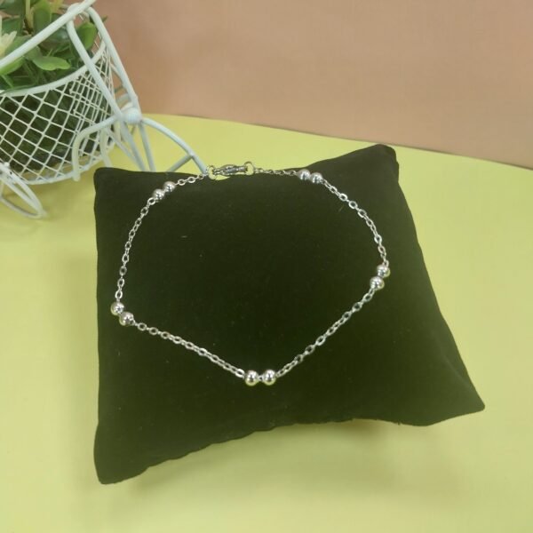 Pulsera doble Bolitas + cadena forzada redondeada
